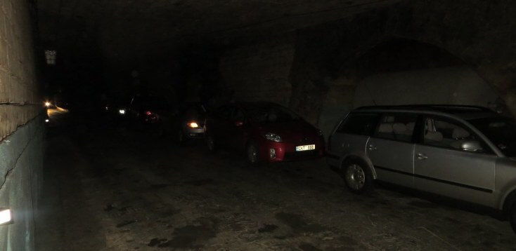 Cars of tourists inside Milestii Mici, Moldova