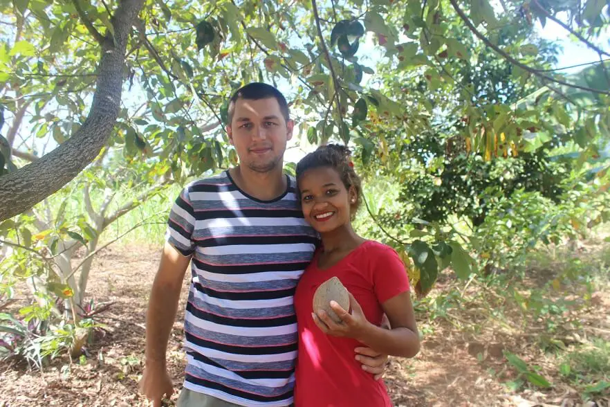 Our guide holding a mamey fruit